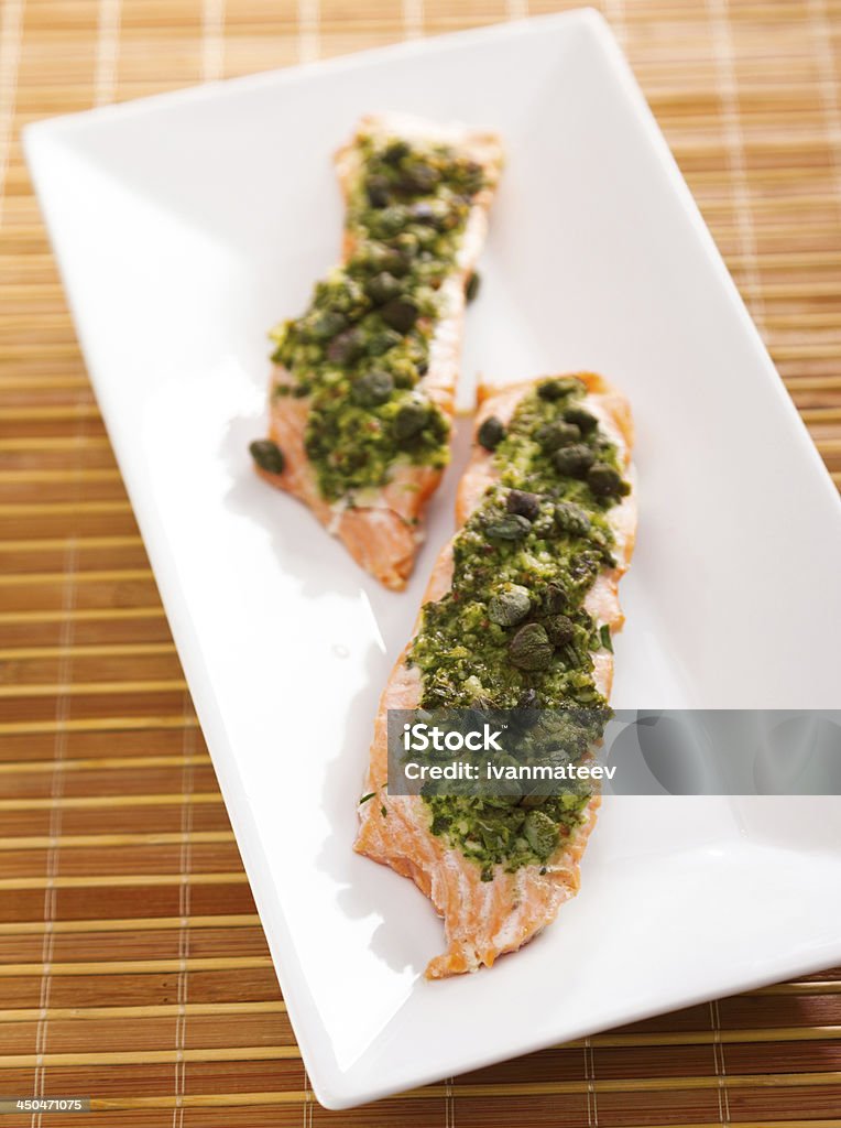 Baked salmon with pesto Baked Stock Photo