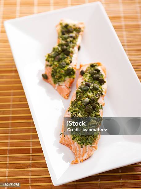 Baked Salmon With Pesto Stock Photo - Download Image Now - Baked, Baked Salmon, Cherry Tomato