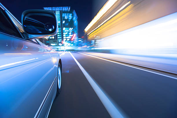 istock Driving in the night city. 450472319
