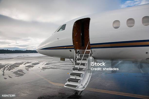 Business Jet At Airport With Stairs Lowered Stock Photo - Download Image Now - Corporate Jet, Travel, Air Vehicle