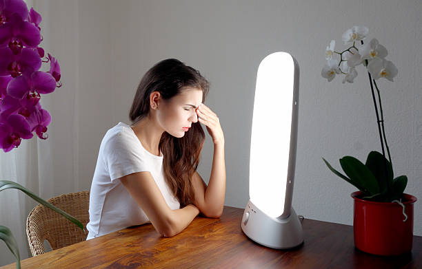 Light therapy against headache Light therapy is a common treatment for a variety of conditions, from auto-immune disorders like psoriasis and eczema, to wound healing, to depression and seasonal affective disorder, to circadian rhythm sleep disorders light therapy stock pictures, royalty-free photos & images