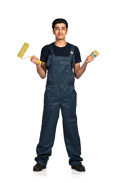 istock Repairman in the construction overalls on a white background 450473961