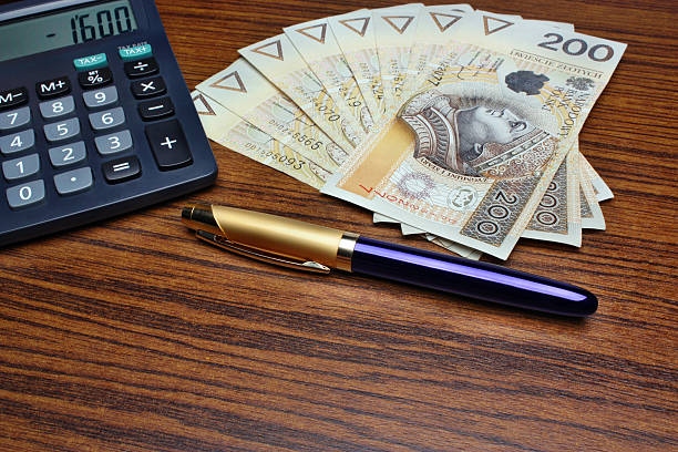 istock Money calculator pen 450474125