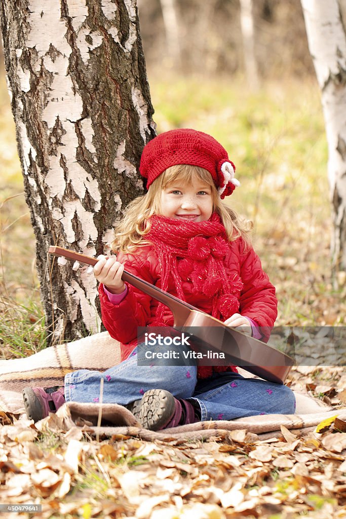 Little Musicista. - Foto stock royalty-free di Autunno