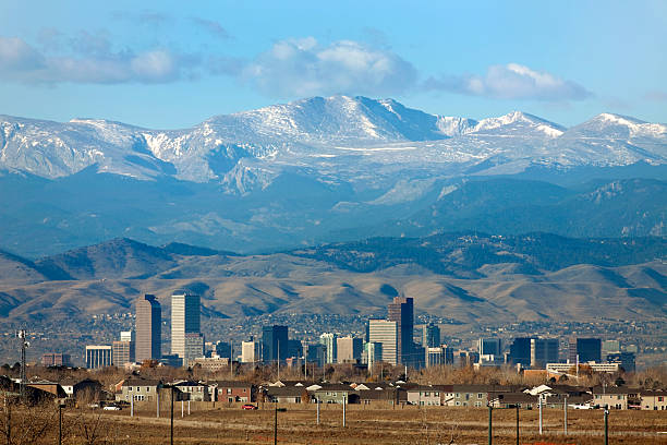 Rocky Mountains Front Range homes and downtown Denver Colorado skyscrapers stock photo