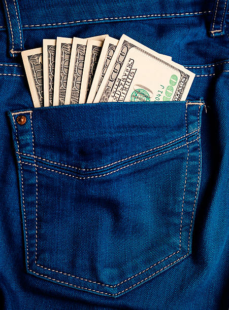 istock Money in jeans pocket 450480883