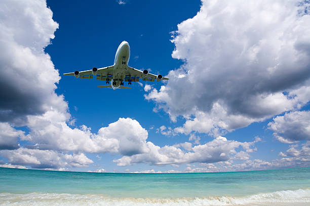 istock Beautiful sea and sky with airplane . 450484927