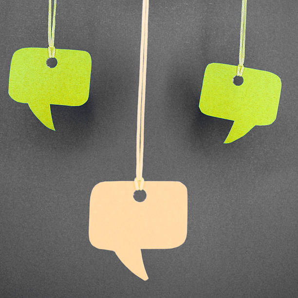 istock Speech bubbles hanging in green color 450506687