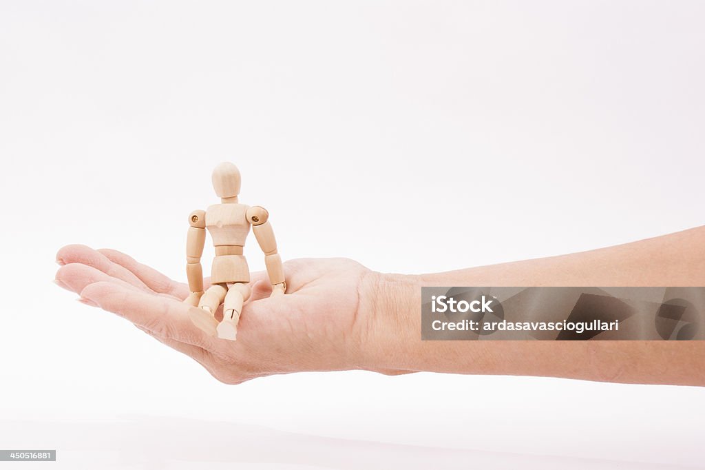 man sitting in woman's palm Clipping path Adult Stock Photo