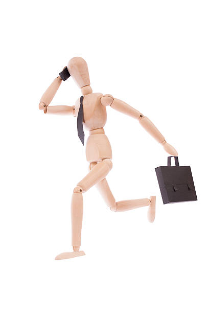 istock bussiness man running talking on his cell phone with clippingpath 450516981