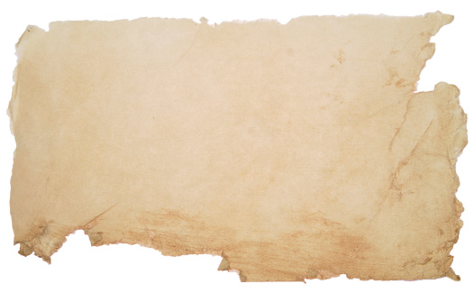 Brown-stained paper with copy space. Isolated on white.