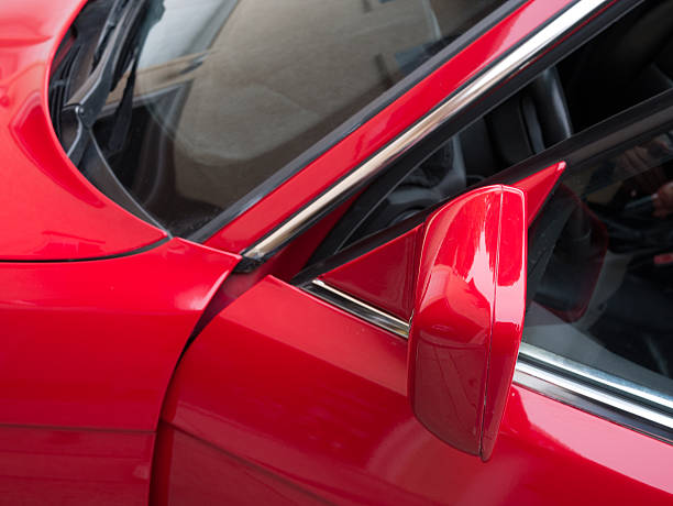 istock Closeup of red car 450540591
