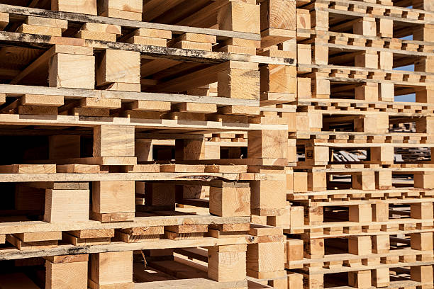 istock Wooden pallet in under sunlight 450543531