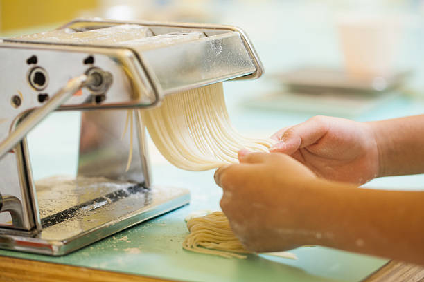 making pasta stock photo