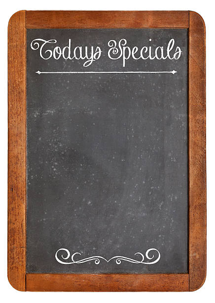 Today Specials on blackboard Today Specials - white chalk menu sign on a vintage slate blackboard isolated on white todays special stock pictures, royalty-free photos & images