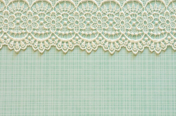 Green paper and pretty white flower lace
