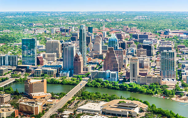 Austin Texas skyline cityscape aerial view Austin Texas downtown cityscape skyline aerial view colorado river photos stock pictures, royalty-free photos & images