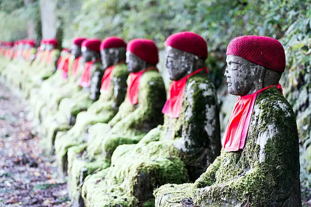 Rows of Jizo (Bodhisattva) statues along the park leading to the Kanmangafuchi Abyss.  This row is called Bake Jizo