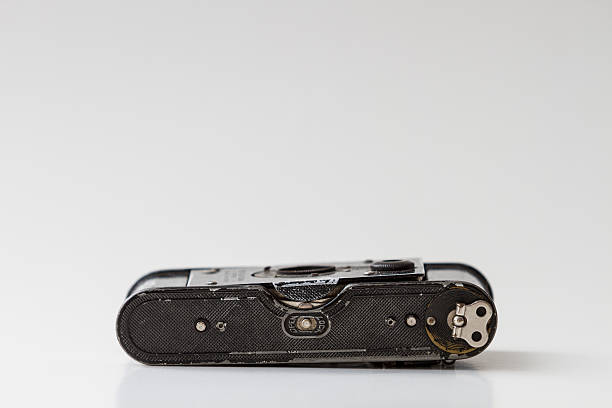 istock Isolated old vintage analog black camera detail close up. 450582169