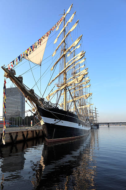 Sailing ship at the pier, Riga - Latvia Sailing ship standing at the pier in the early morning, Riga (Latvia) krusenstern stock pictures, royalty-free photos & images