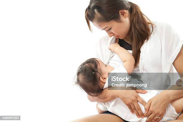 Mother Is Breast Feeding For Her Baby Stock Photo - Download Image Now - Adult, Baby - Human Age, Bed - Furniture