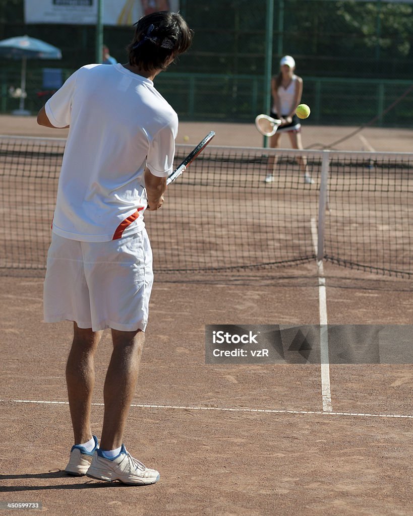 Entrenador de tenis - Foto de stock de Adulto joven libre de derechos