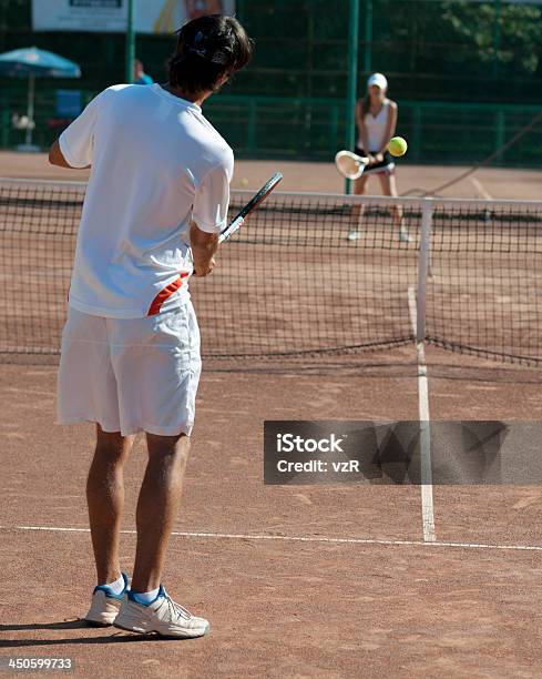 Entrenador De Tenis Foto de stock y más banco de imágenes de Adulto joven - Adulto joven, Agresión, Aire libre