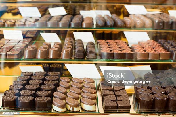 Shop Window With Selection Of Specialty Chocolates Stock Photo - Download Image Now - Chocolate Factory, Bruges, Christmas