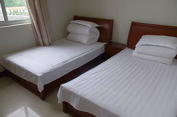 istock Simple and clean hotel Bedroom 450612933