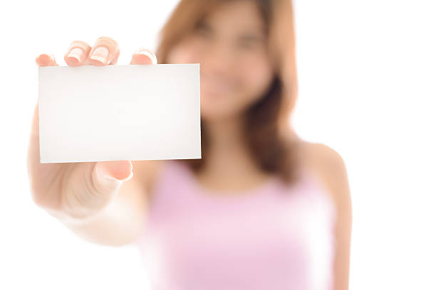 istock Woman showing blank white sign. 450613723