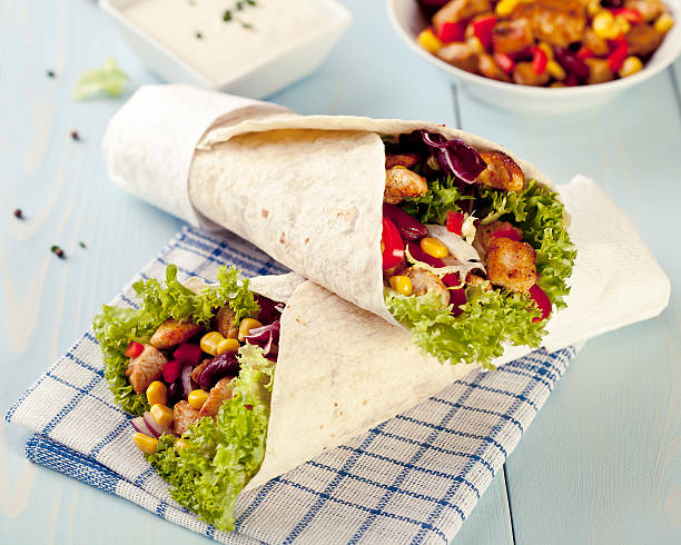 istock tortilla wraps with meat and vegetables 450643485
