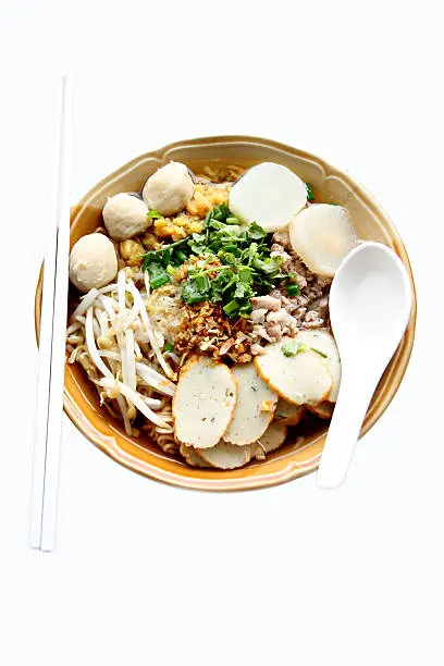 Thai Noodles soup in bowl on white background.