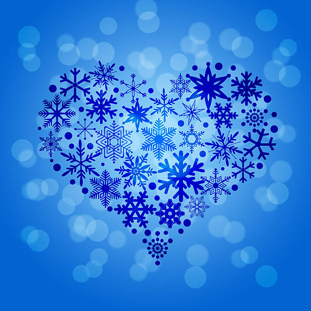 istock Christmas Snowflakes Heart Shape on Blurred Background 450646641