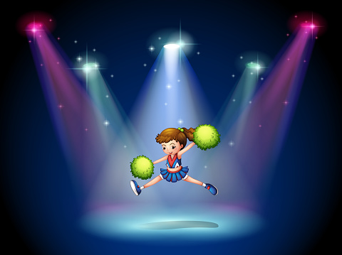 cheerleader jumping on the stage with spotlights