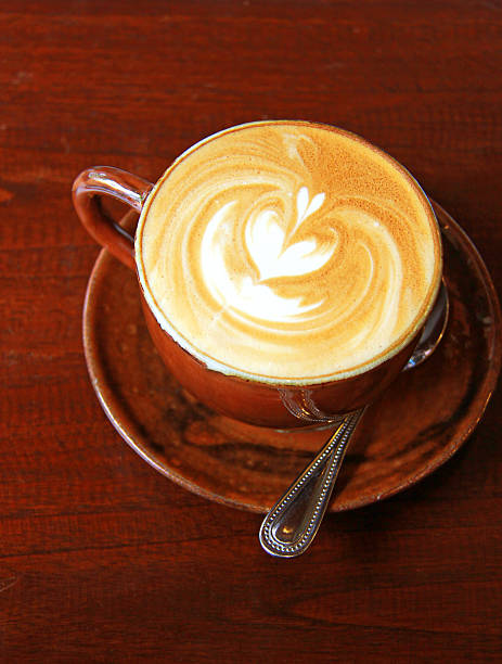 Cappuccino or latte coffee with heart shape