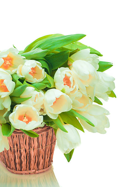 istock Beautiful tulips in basket 450663065