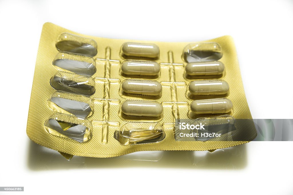 Amarelo embalagem blister de comprimido isolado a branco - Royalty-free Amarelo Foto de stock