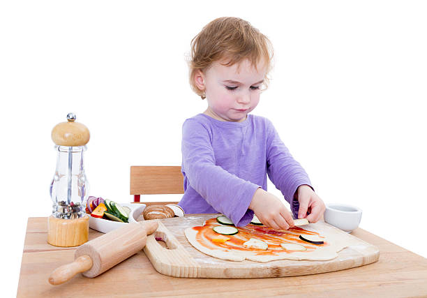 child making fresh pizza stock photo
