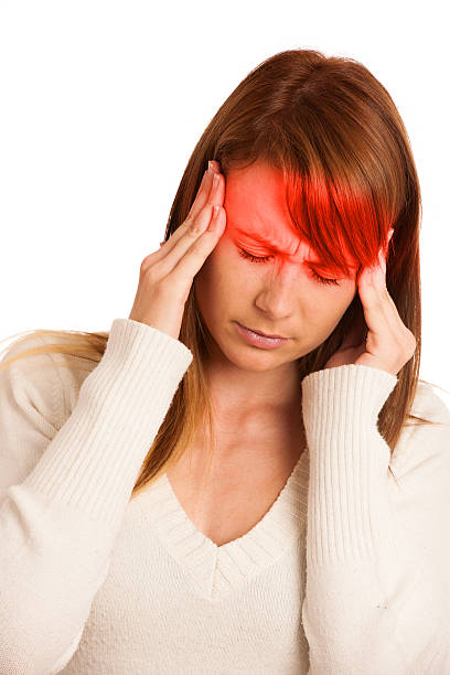 istock Young woman with headache 450664437