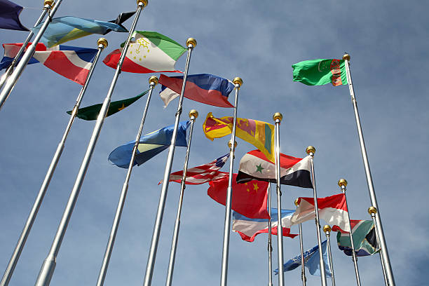istock Different countries flags united together against blue sky 450667799