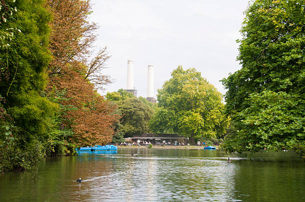 A view of Battersea Park in London with the old power station in the background.
