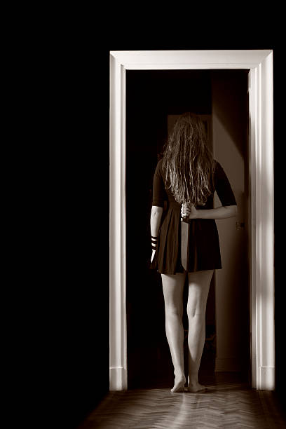 istock woman with a knife 450674473