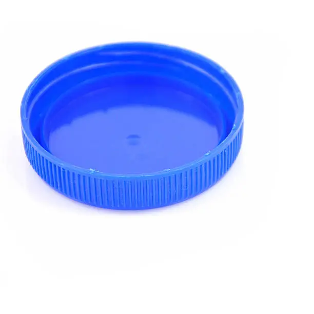 Plastic bottle caps isolated against a white background