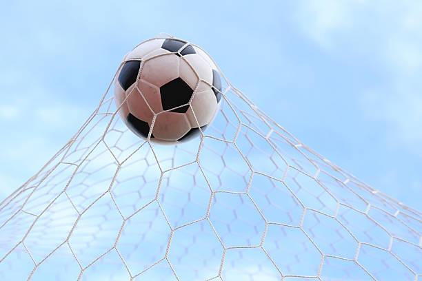 istock Soccerball in net 450705075