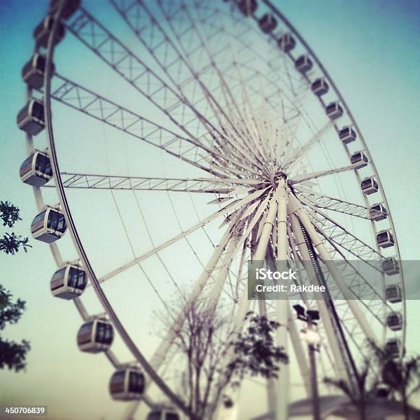 A Large Spinning Ferris Wheel At A Fair Stock Photo - Download Image Now - Activity, Amusement Park, Arts Culture and Entertainment