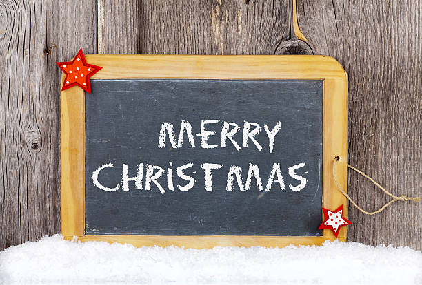 istock Christmas Greetings old Slate Chalkboard 450710333