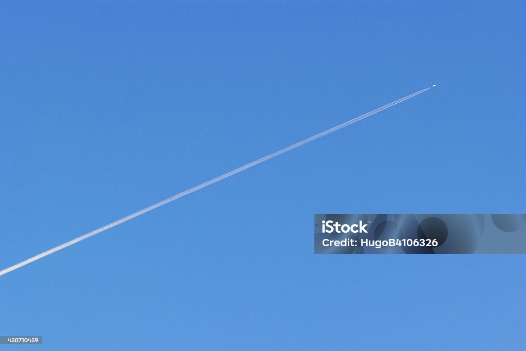 blue sky with contrail clear blue sky with contrail of jet plane Air Vehicle Stock Photo