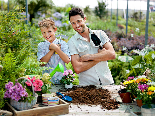 istock father and son gardening 450718673
