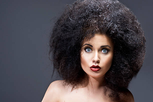 istock Beautiful woman with huge afro 450722975