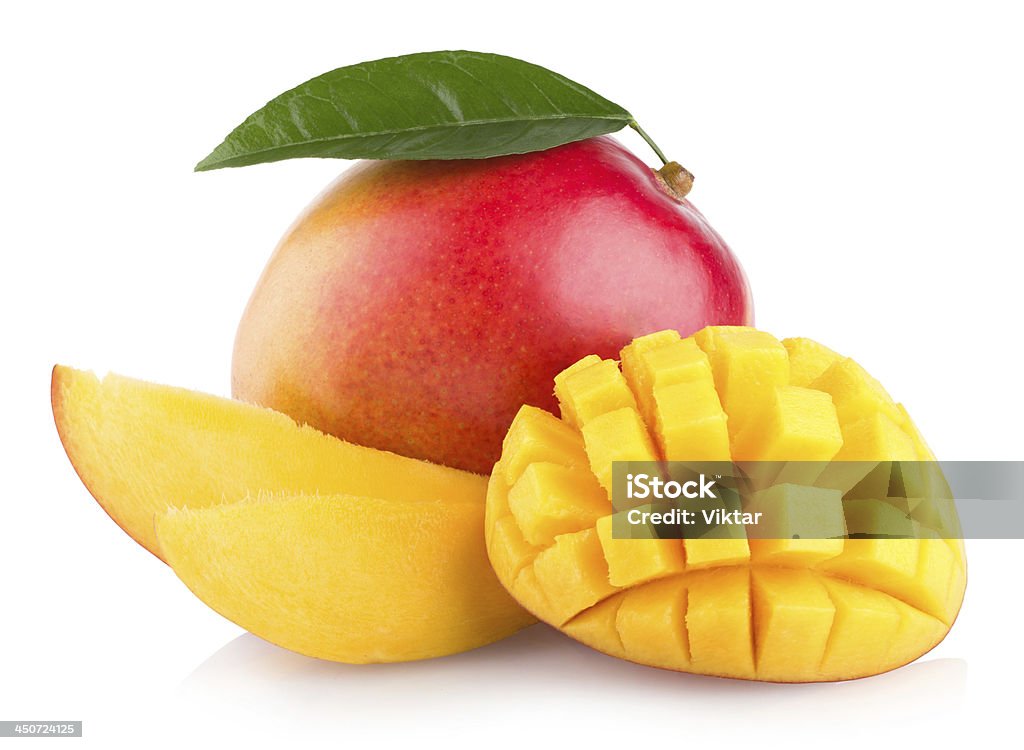 Multiple mangos One cut and one sliced in a pattern fresh mango with slices isolated on white background Mango Fruit Stock Photo